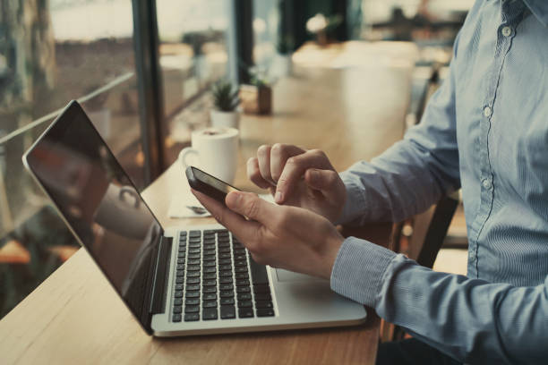 social media, closeup of hands holding smartphone in cafe, banking online, businessman with mobile internet